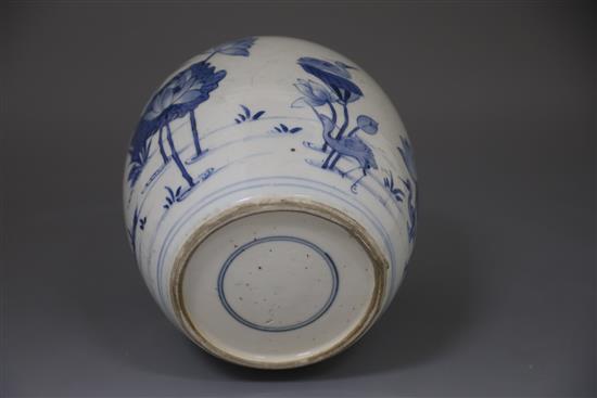 A Chinese blue and white ovoid jar, Kangxi period, H. 20.5cm, excluding wood stand and cover